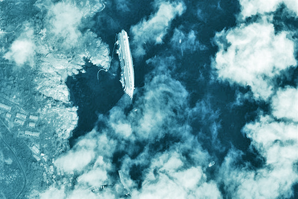 A satellite view of Costa Concordia on the rocks of Isola del Giglio, Italy. SOURCE DIGITAL GLOBE