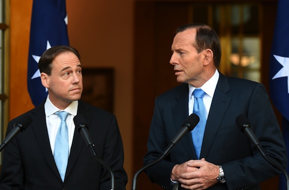 Greg Hunt and Tony Abbott at a Parliament House press conference following the repeal of the carbon tax legislation. PHOTO AAP/Lukas Coch