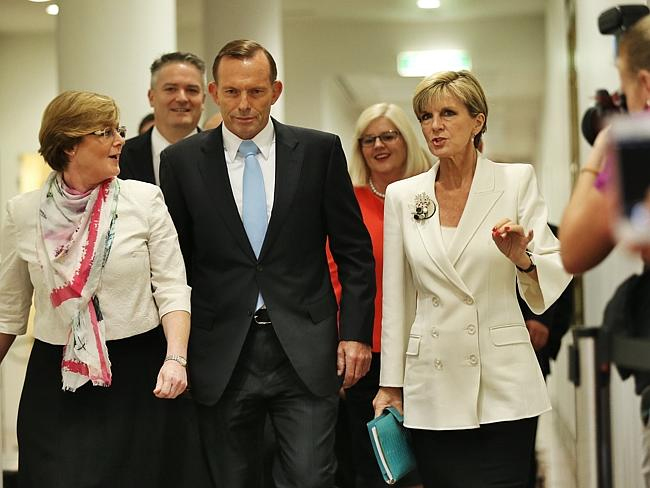 Tony Abbott and colleagues approach the party room ahead of the spill vote. PHOTO Craig Greenhill/New Corp Australia