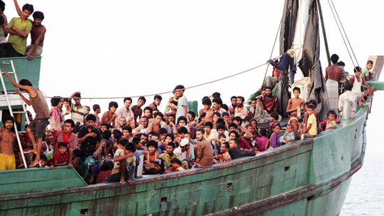 Rohingyas and Bangladeshi migrants on a fishing boat off the coast of Julok, Indonesia, last week. PHOTO Reuters