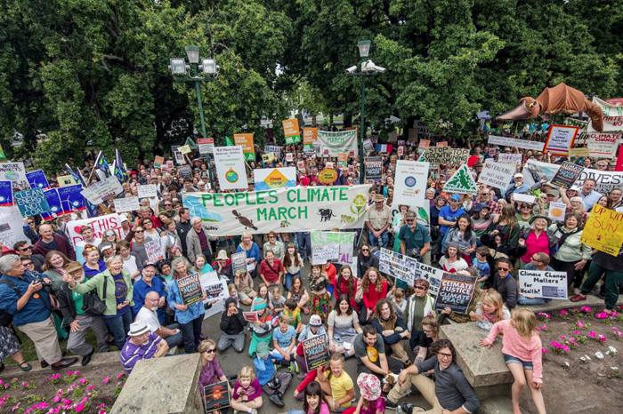 Thousands rallied on Hobart’s Parliament Lawns in support of strong climate decisions in Paris. PHOTO Rob Blakers