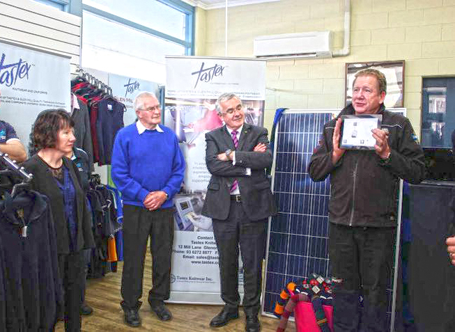Rob Manson of I Want Energy explains the finer points of solar power, watched by (left to right) Tastex executive officer Vicki Hawker, chairman Maurie Harris, and Andrew Wilkie MP, who launched the solar project last month. PHOTO Tastex