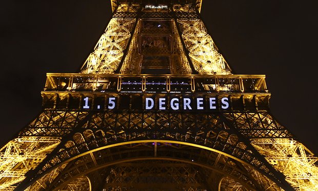Paris’s Eiffel Tower displays the aspirational target of 1.5C, now fast becoming an unachievable goal. PHOTO The Guardian