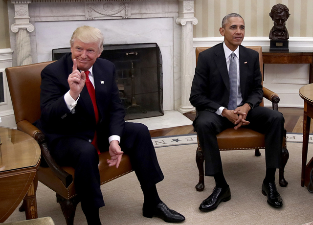 President-elect Donald Trump, left, talks after a meeting with U.S. President Barack Obama, right, in the Oval Office on Thursday. PHOTO Win McNamee/Getty Images