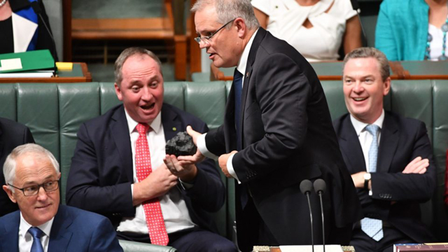 “Don’t be afraid” was the taunt of the Treasurer, Scott Morrison, as he waved his piece of coal in parliament. PHOTO AAP