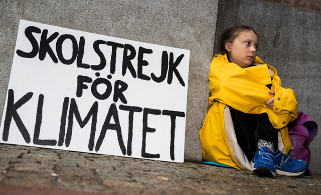 Greta Thunberg, 15, outside the Swedish Parliament last August in her protest politicians’ failure to act on climate change. PHOTO Michael Campanella / Guardian